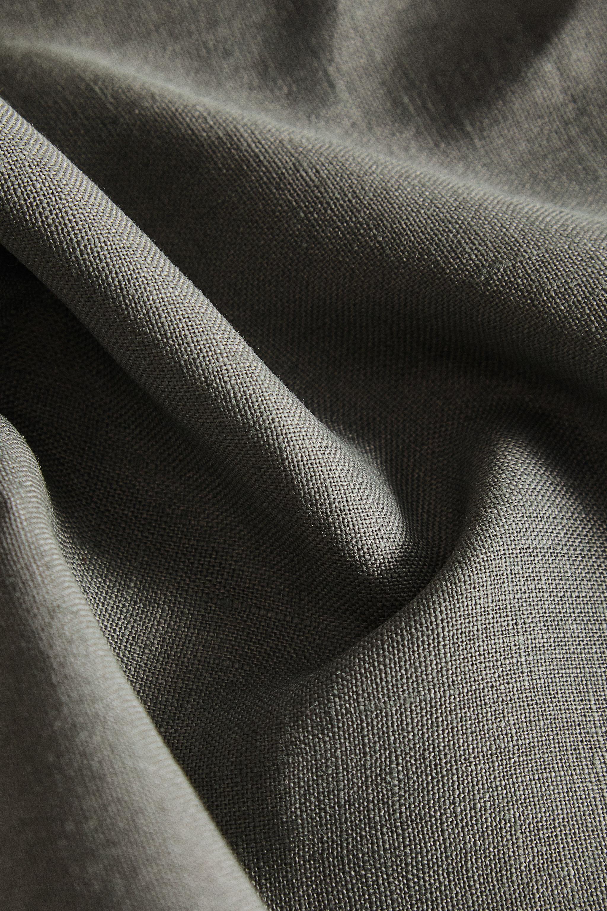 SET OF PLAIN-COLORED LINEN NAPKINS